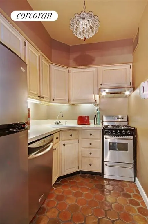 New York City Real Estate | View 205 East 63rd Street, 6H | Renovated kitchen with Mediterranean ceramic tiles | View 5