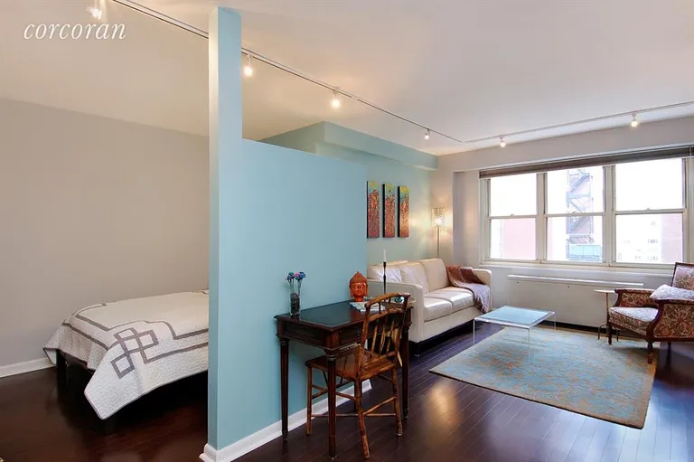 New York City Real Estate | View 205 East 63rd Street, 6H | 3/4 height wall separates bedroom from living area | View 2