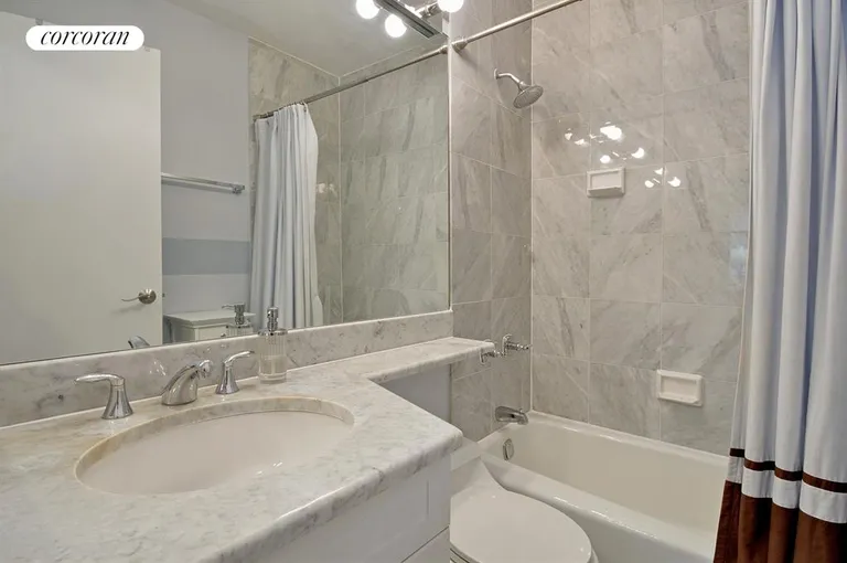 New York City Real Estate | View 45 East 25th Street, 22C | Sparkling white marble bathroom newly refinished! | View 5