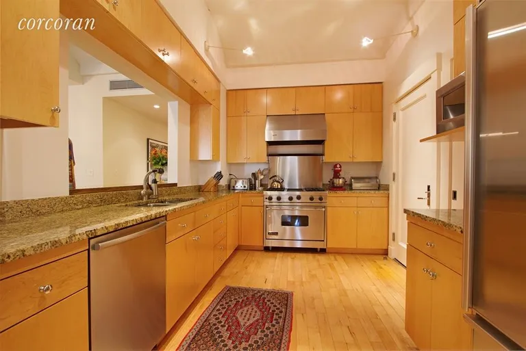 New York City Real Estate | View 27 North Moore Street, 6A | Large kitchen with vented hood and ample cabinets. | View 5