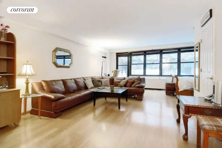 New York City Real Estate | View 225 East 57th Street, 1N | Spacious Living Room | View 2