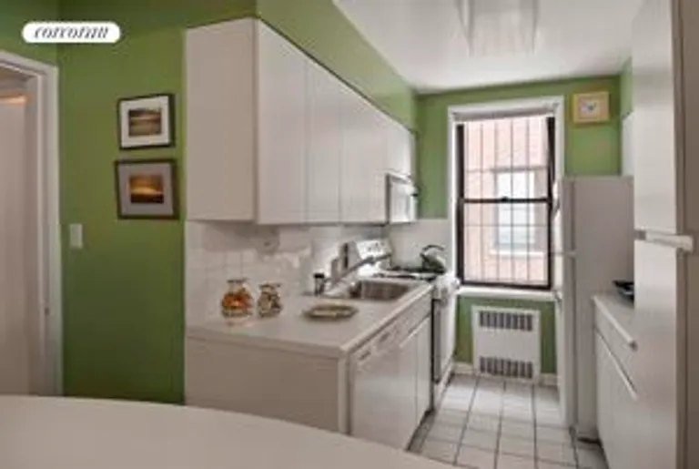 New York City Real Estate | View 30 East 9th Street, 3BB | Windowed Kitchen | View 4