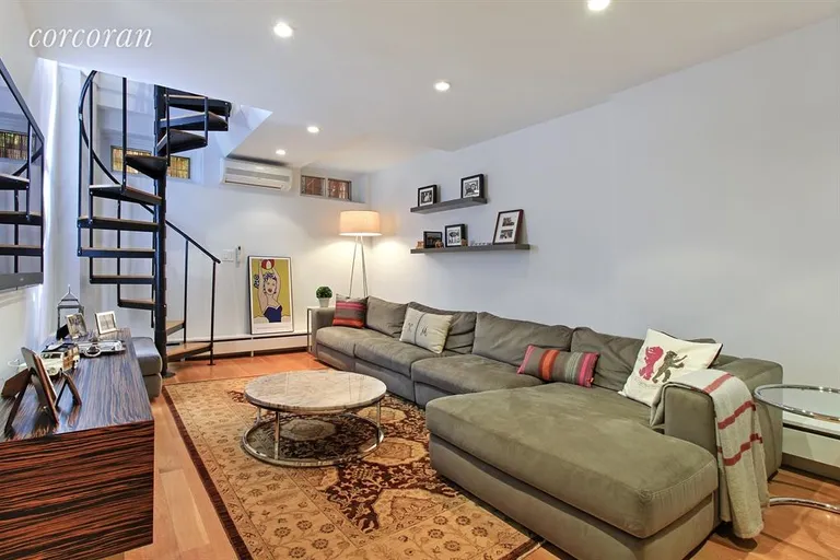 New York City Real Estate | View 210 West 19th Street, 1G | Living Room | View 2