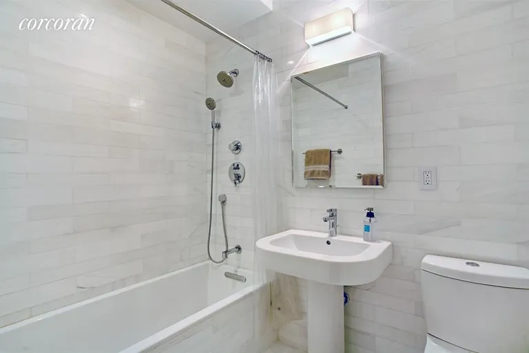 New York City Real Estate | View 200 East 57th Street, 11C | Master Bathroom | View 4