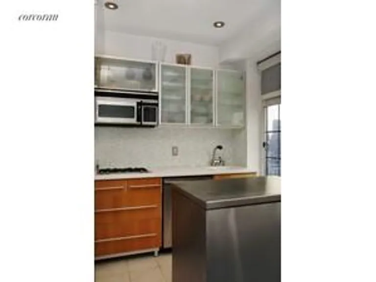 New York City Real Estate | View 410 West 24th Street, 16G | Open Kitchen | View 3