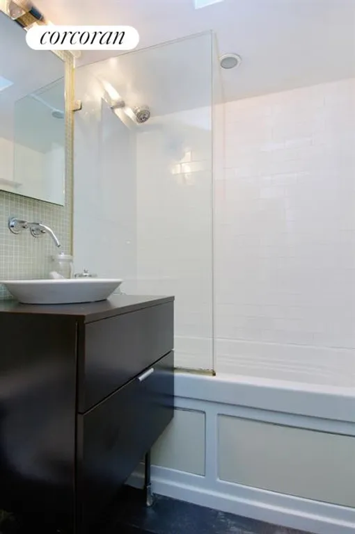 New York City Real Estate | View 320 East 42Nd Street, 704 | Renovated Bathroom | View 4