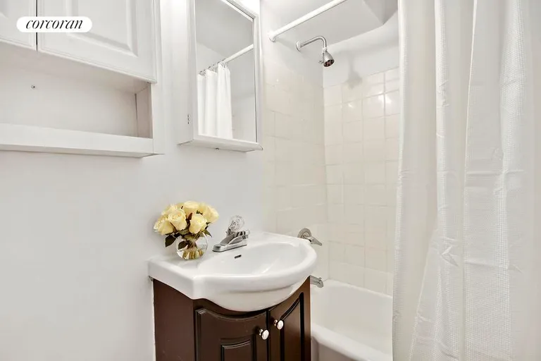New York City Real Estate | View 311 East 75th Street, 6H | Renovated bathroom | View 4