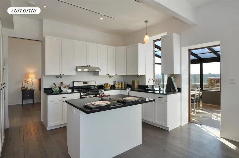 New York City Real Estate | View 689 Fort Washington Avenue, PH4 | Open kitchen with pass thru window to Solarium. | View 3
