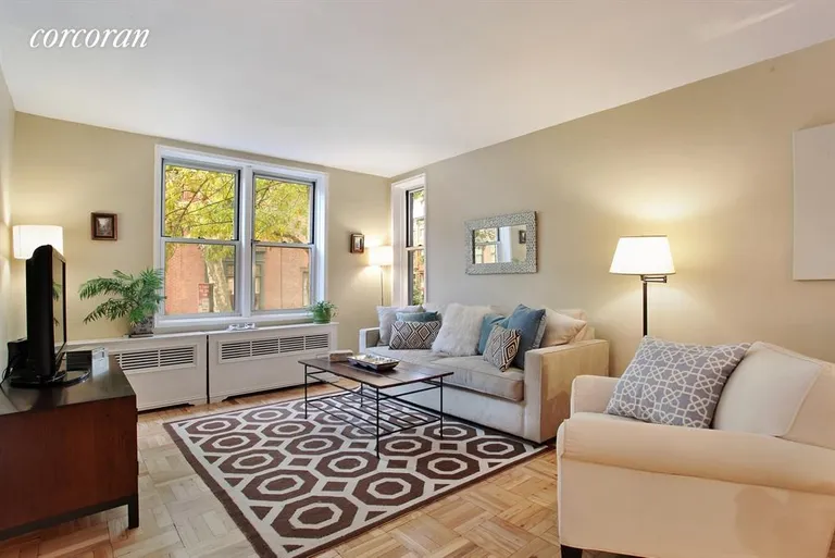 New York City Real Estate | View 245 Henry Street, 1G | Sun-filled living room... | View 2