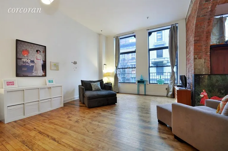 New York City Real Estate | View 138 Broadway, 2C | Bright, open living room with nearly 13' ceilings. | View 2
