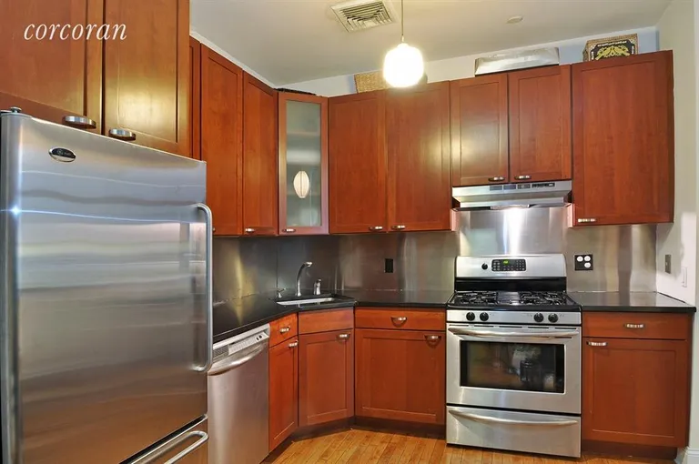 New York City Real Estate | View 138 Broadway, 2C | Modern kitchen with high-end appliances. | View 4