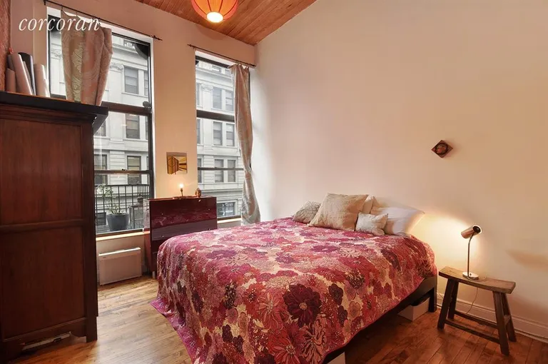 New York City Real Estate | View 138 Broadway, 2C | Spacious, airy bedroom with ample closet space. | View 3