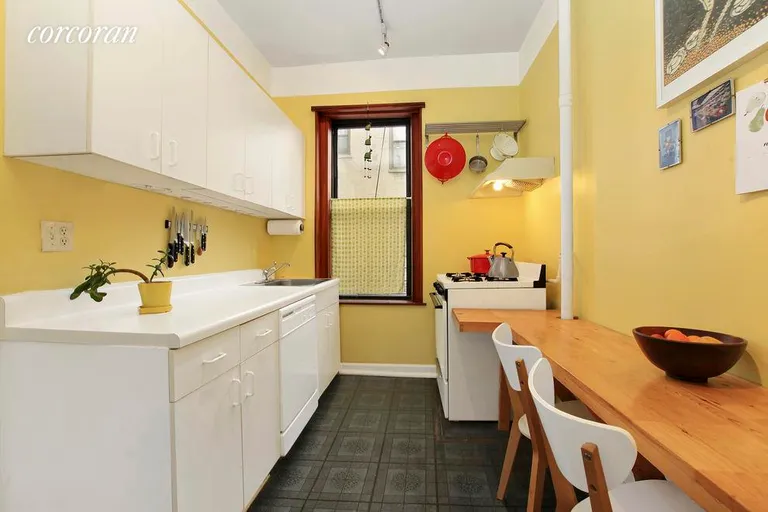 New York City Real Estate | View 328 Sterling Place, 4d | Bright windowed Kitchen w/ built-in breakfast bar | View 2