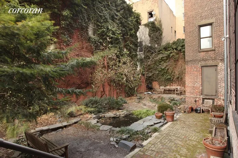 New York City Real Estate | View 143 South 8th Street, 3A | Common Garden with Koi Pond | View 9