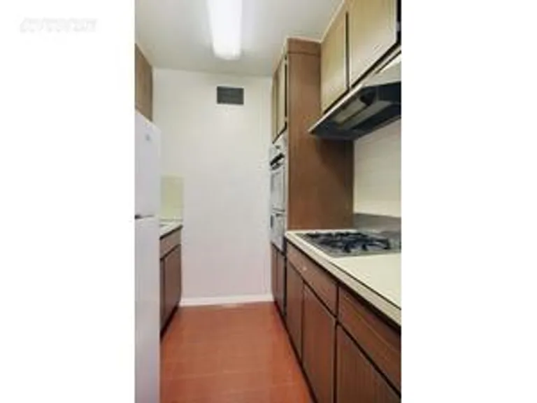 New York City Real Estate | View 118 East 60th Street, 5D | Kitchen | View 4
