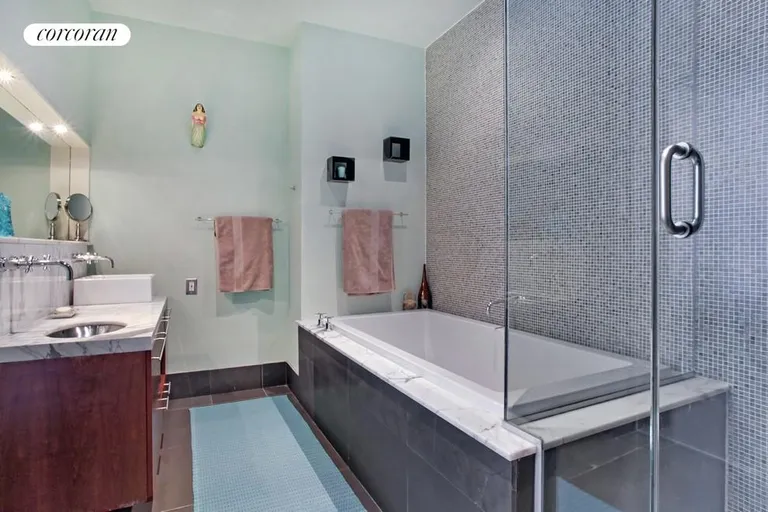 New York City Real Estate | View 60 Broadway, 2M | Spa Bathroom with Shower and Soaking Tub! | View 4