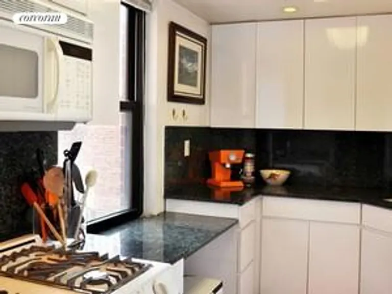 New York City Real Estate | View 201 EAST 25TH STREET, 8A | Granite Counters and  Window | View 5