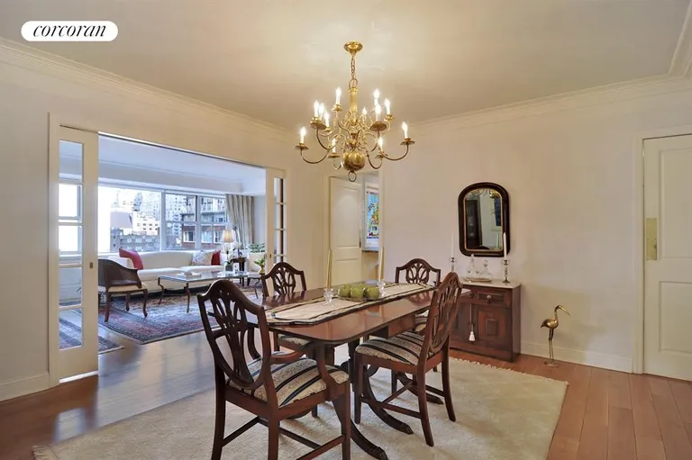 New York City Real Estate | View 130 East 63rd Street, 10B | Beautiful formal dining with sliding glass doors | View 3