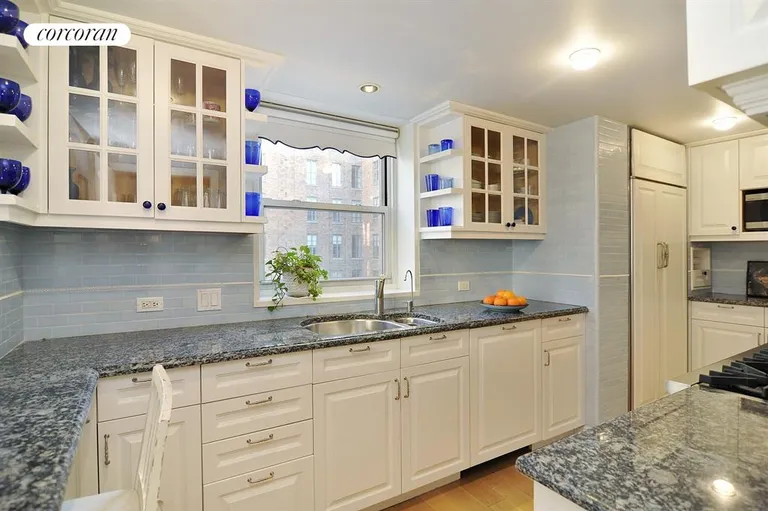 New York City Real Estate | View 130 East 63rd Street, 10B | Eat-in bar seating in dream kitchen | View 5