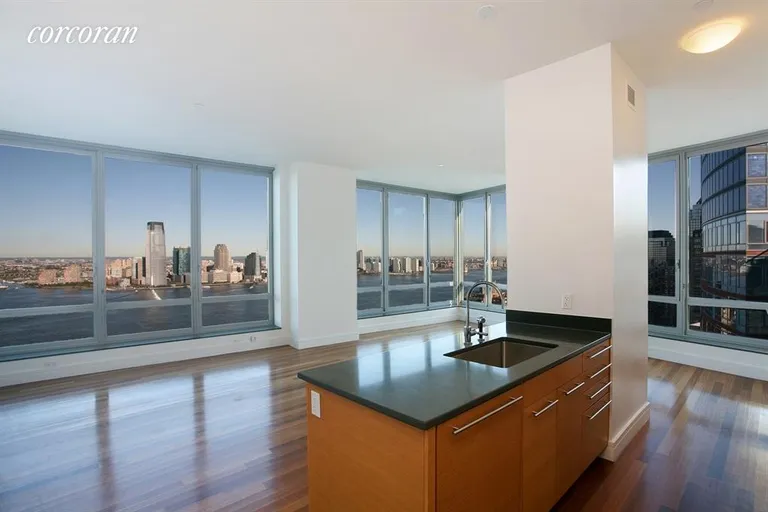 New York City Real Estate | View 30 West Street, PH3A | Kitchen / Living Room | View 7