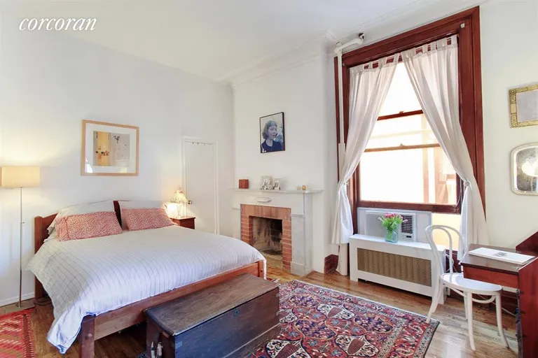 New York City Real Estate | View 321 Clinton Avenue, 6 | Master Bedroom with WBFP | View 3