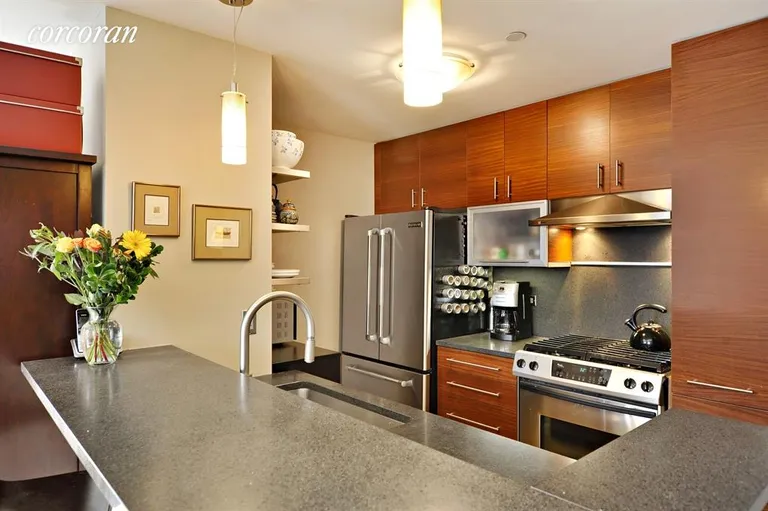 New York City Real Estate | View 225 West 60th Street, 16B | Open kitchen with breakfast bar | View 3