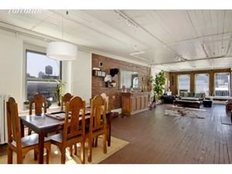 New York City Real Estate | View 64 Grand Street, 7 | 2 Beds, 2 Baths | View 1