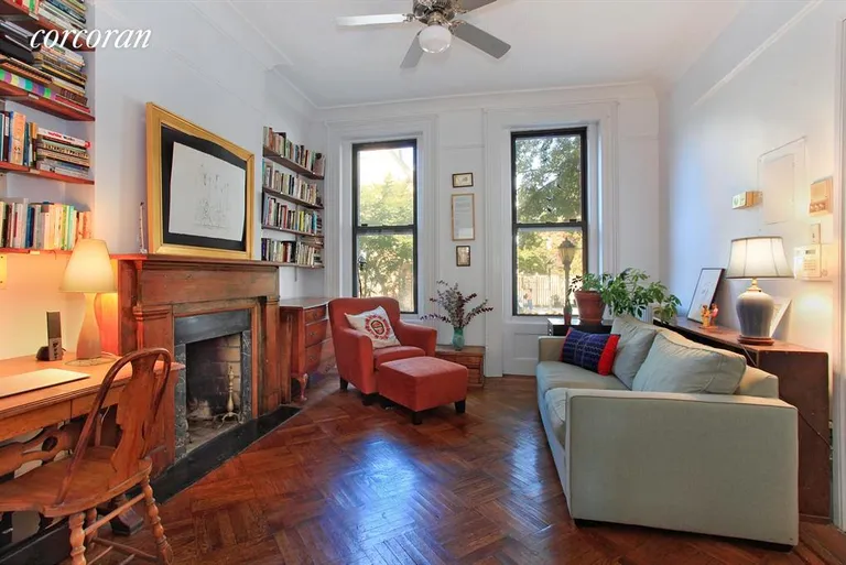 New York City Real Estate | View 422 Atlantic Avenue, 1 | Living Room with working fireplace | View 2