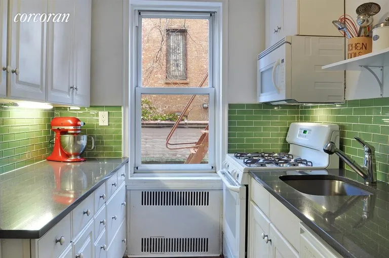 New York City Real Estate | View 25 Plaza Street West, 1M | Spiffy, windowed and colorful renovated kitchen | View 3