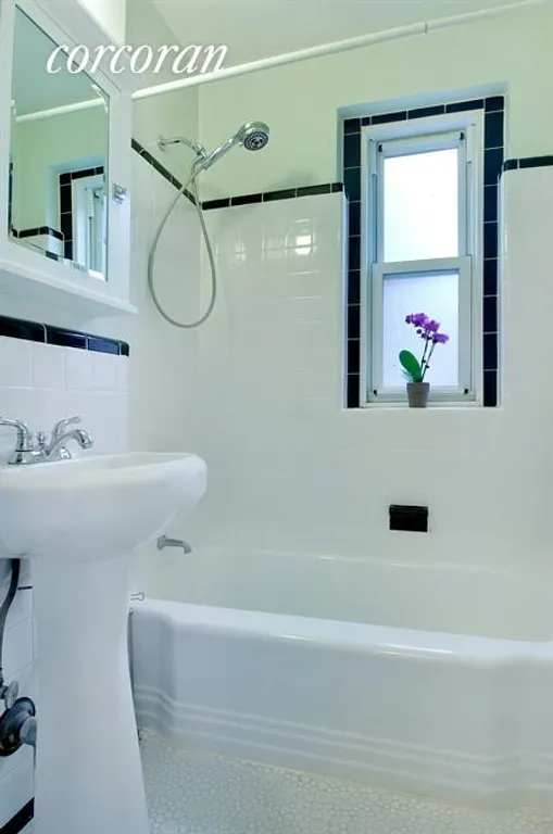 New York City Real Estate | View 25 Plaza Street West, 1M | Classically renovated and windowed bathroom | View 6