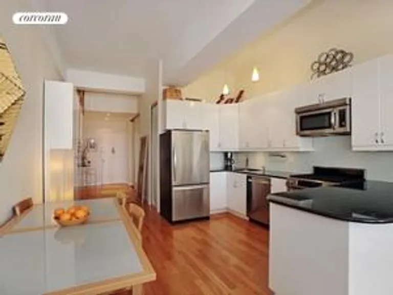 New York City Real Estate | View 315 Seventh Avenue, 12B | Kitchen and Dining Area | View 4