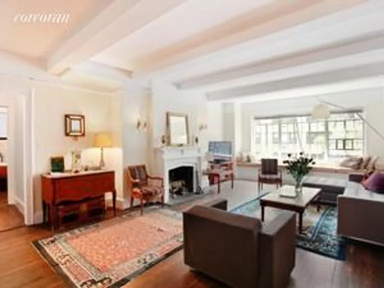 New York City Real Estate | View 40-50 East 10th Street, 4E | Living Room w Fireplace | View 2