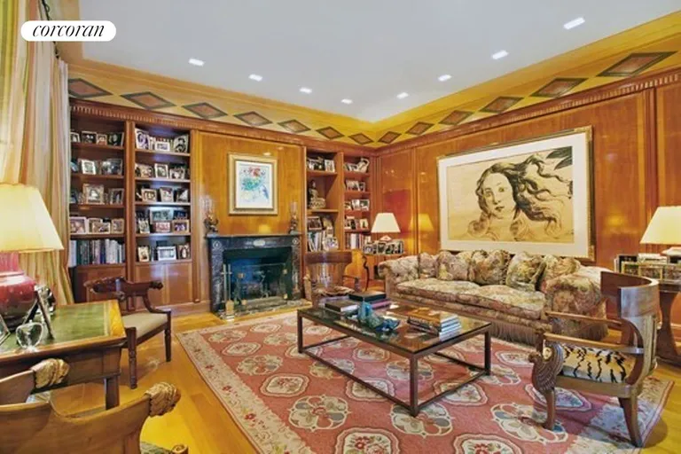 New York City Real Estate | View 785 Fifth Avenue, PH17-18 | Custom-Milled Mahogany Paneled Library | View 8