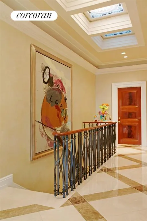 New York City Real Estate | View 785 Fifth Avenue, PH17-18 | Striated Marble Floors in the Hallway | View 9