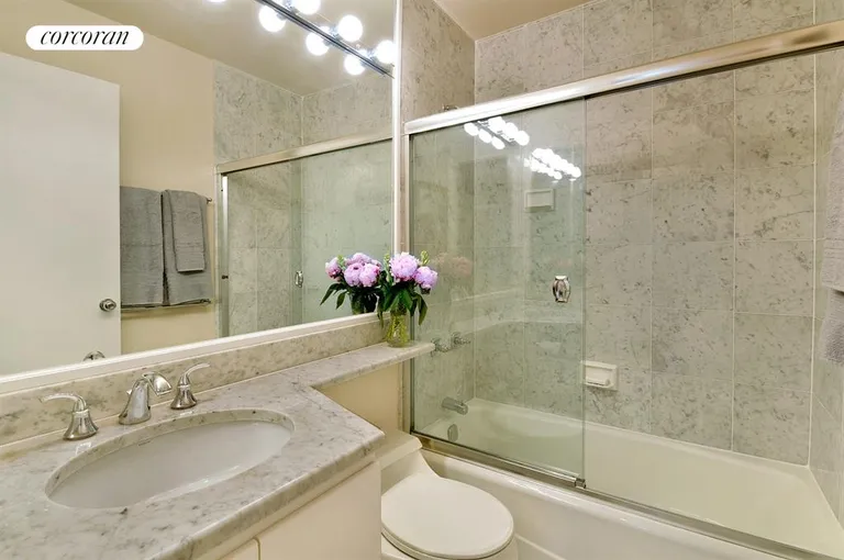 New York City Real Estate | View 45 East 25th Street, 11C | Refinished bathroom in sparkling white marble | View 5