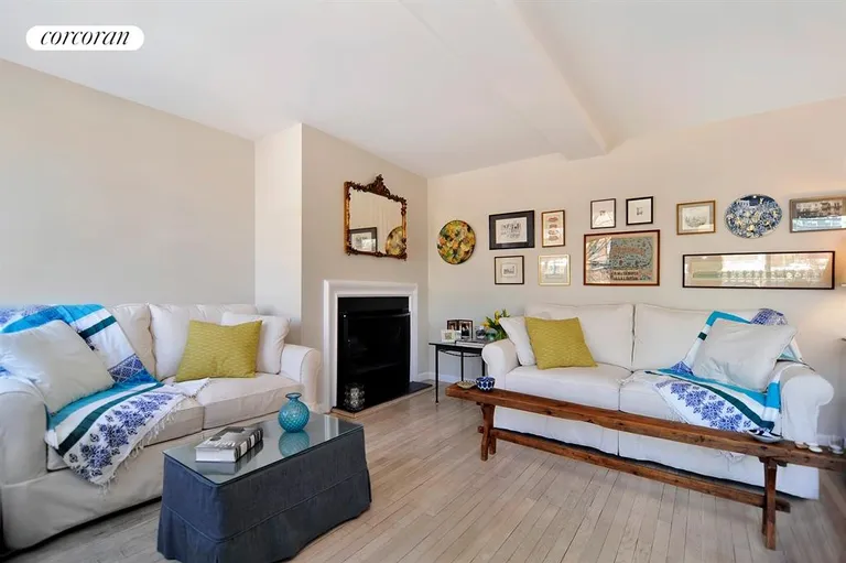 New York City Real Estate | View 77 Horatio Street, 3B | Spacious Living Room with wood-burning Fireplace | View 2
