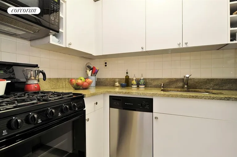 New York City Real Estate | View 77 Horatio Street, 3B | Well-appointed kitchen with stone countertops | View 4