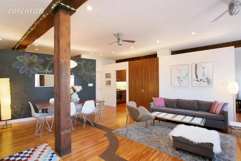New York City Real Estate | View 29 Tiffany Place, 5EF | Living Room / Dining Room | View 3