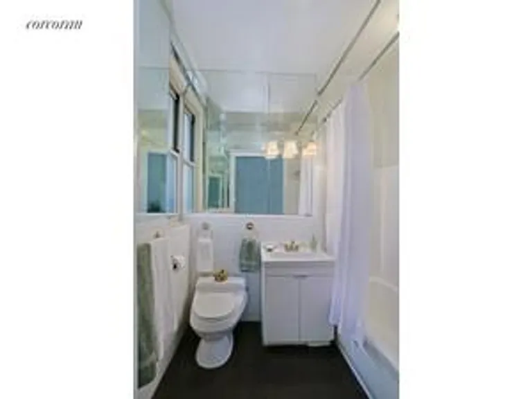 New York City Real Estate | View 10 East 85th Street, 9D | Windowed Master Bathroom | View 6