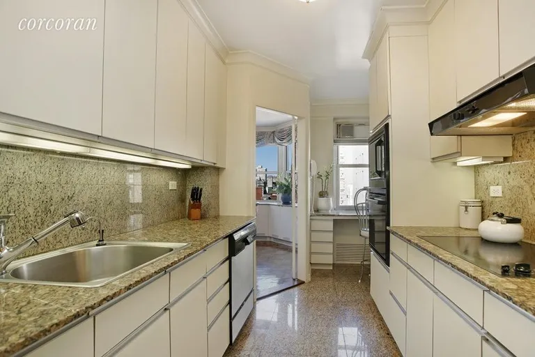 New York City Real Estate | View 35 East 75th Street, 10D | Windowed Kitchen with sitting area | View 4