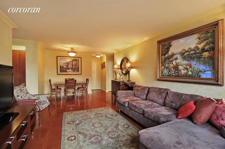 New York City Real Estate | View 301 East 79th Street, 4H | Living Room & Spacious Dining Area | View 2