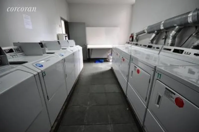 New York City Real Estate | View 204 Huntington Street | laundry room | View 7