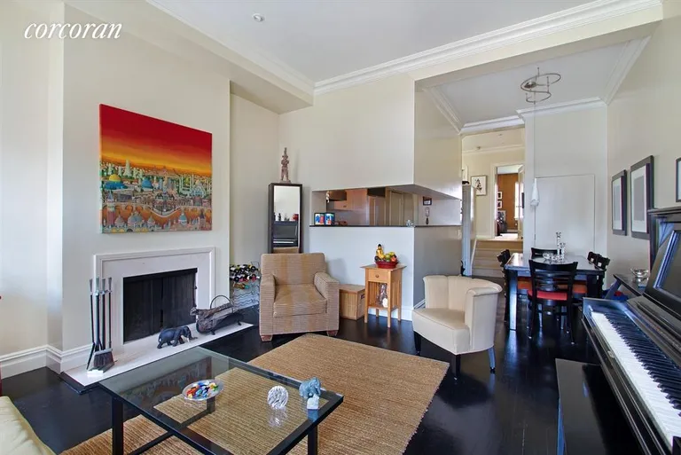 New York City Real Estate | View 429 West 22nd Street, 4G | Living and dining area with open kitchen. | View 2