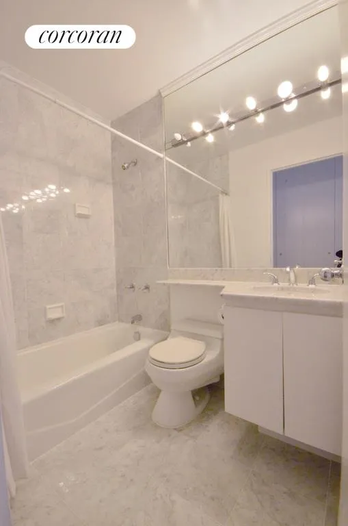 New York City Real Estate | View 45 East 25th Street, 27B | Two Carrera marble baths! | View 12