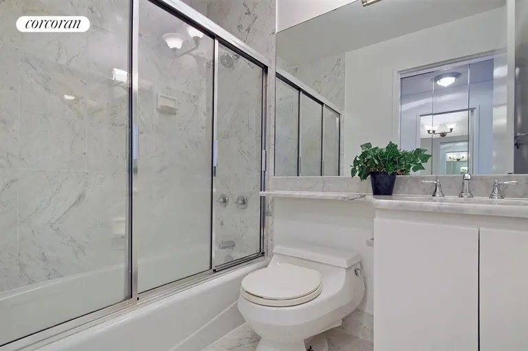 New York City Real Estate | View 45 East 25th Street, 9B | Refinished Carerra marble bathrooms! | View 7