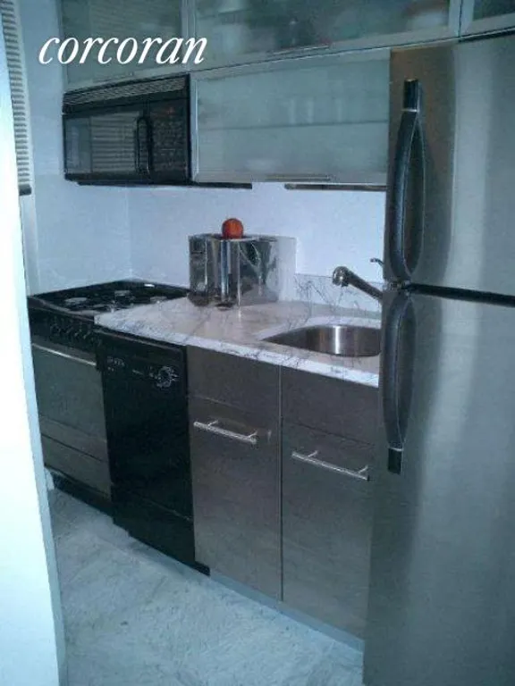 New York City Real Estate | View 135 East 39th Street, 4A | Stainless Kitchen | View 3