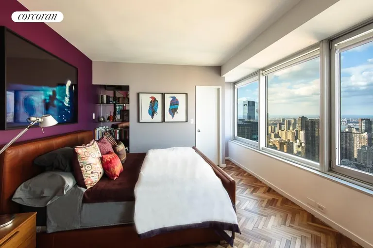 New York City Real Estate | View 150 West 56th Street, 6104 | Master Bedroom with River & Central Park View | View 4