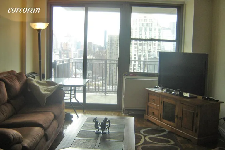New York City Real Estate | View 301 East 79th Street, 27N | Spacious Living Room | View 2