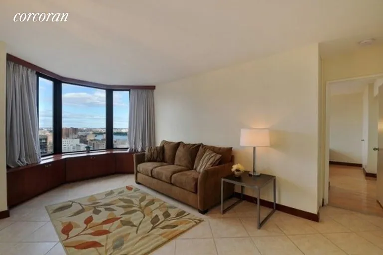 New York City Real Estate | View 300 East 93rd Street, 34C | A large Living Room opens to a bright, open view! | View 3
