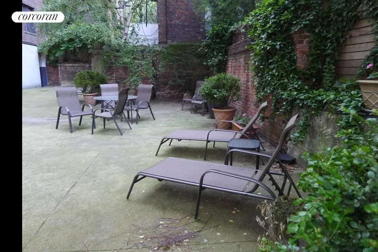 New York City Real Estate | View 305 West 18th Street, 3G | Common courtyard with seating | View 5